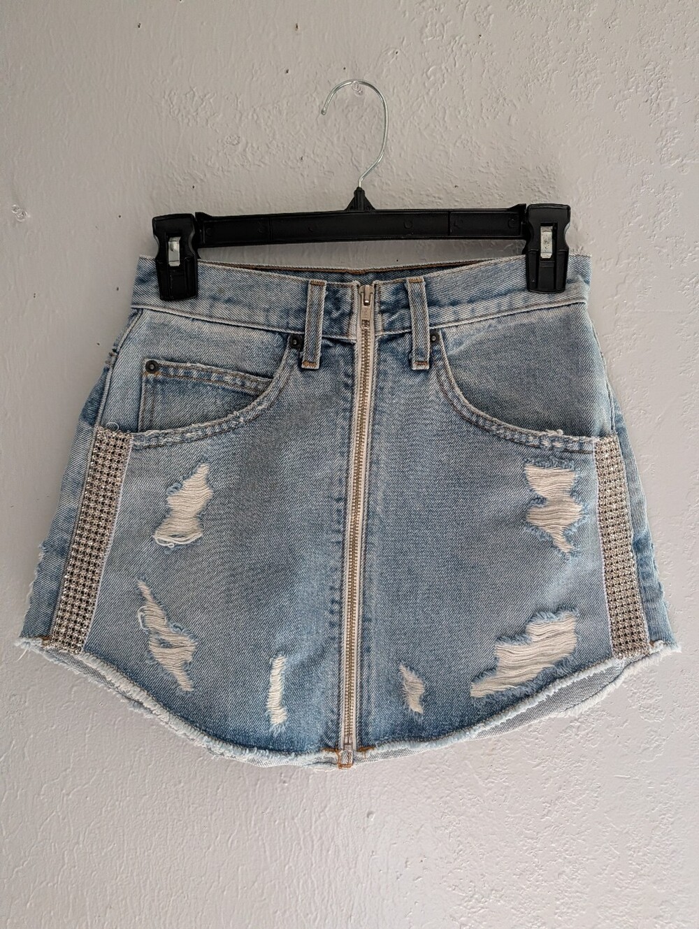 Carmar Light Blue Distressed Denim Mini Skirt with Front Zip and Rhinestone Trim